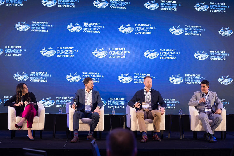 Four-person panel on the main stage at ADIC 2026