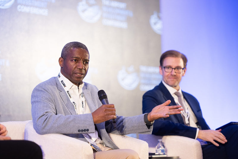 Panelist making a point during a session at ADIC 2026