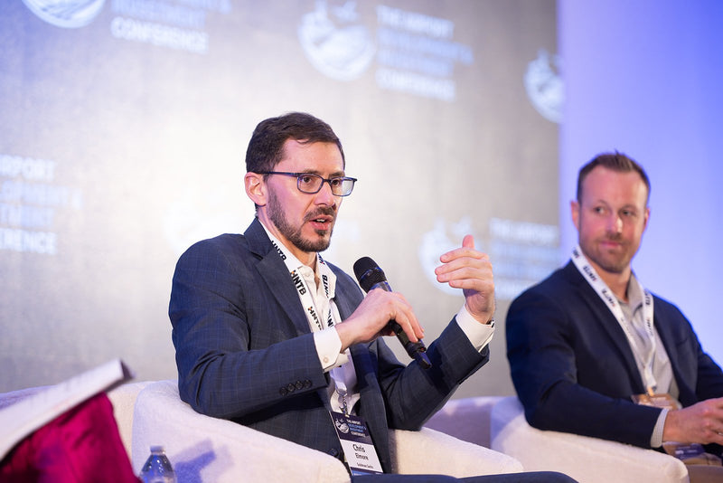 Panelist answering a question on stage at ADIC 2026