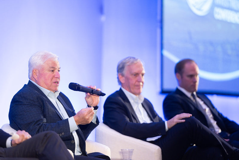 Panelist speaking during a main stage discussion at ADIC 2026