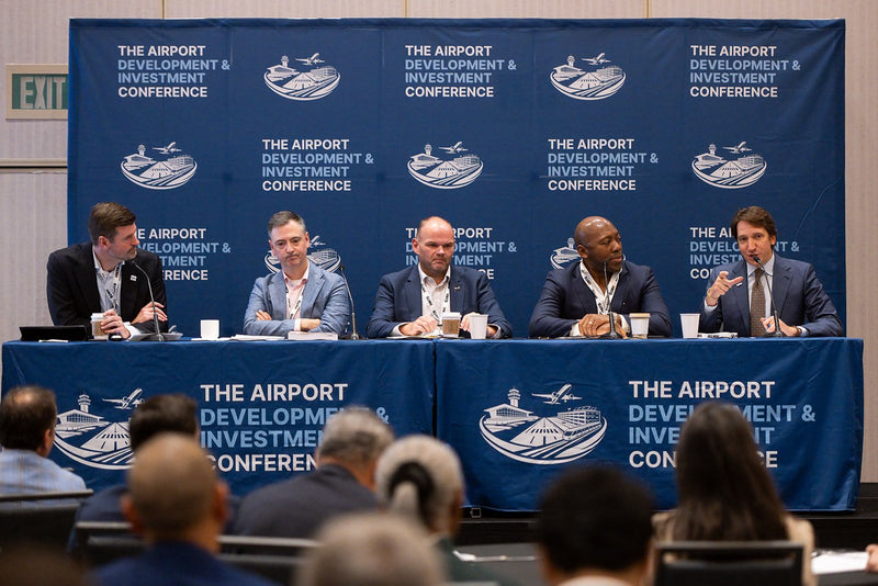 Five-person panel in a breakout session at ADIC 2026