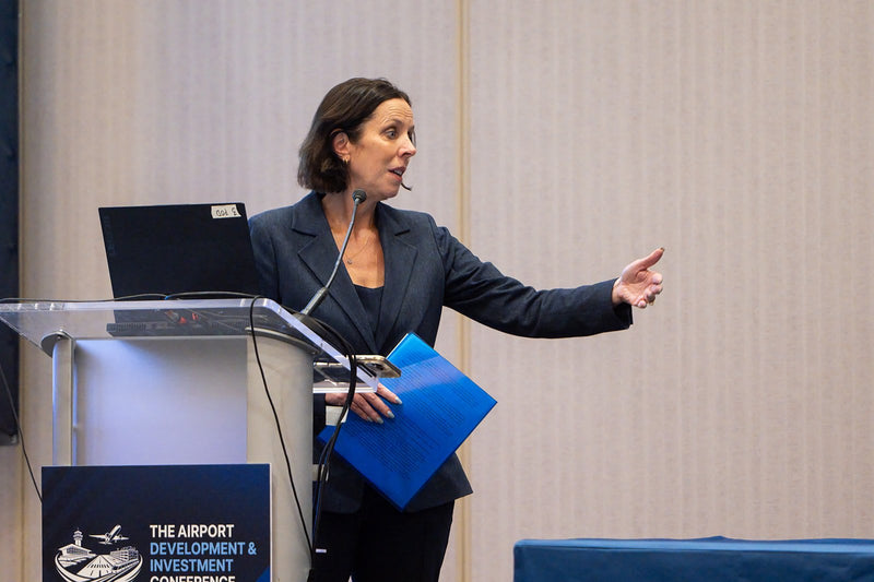 Moderator introducing a breakout session at ADIC 2026